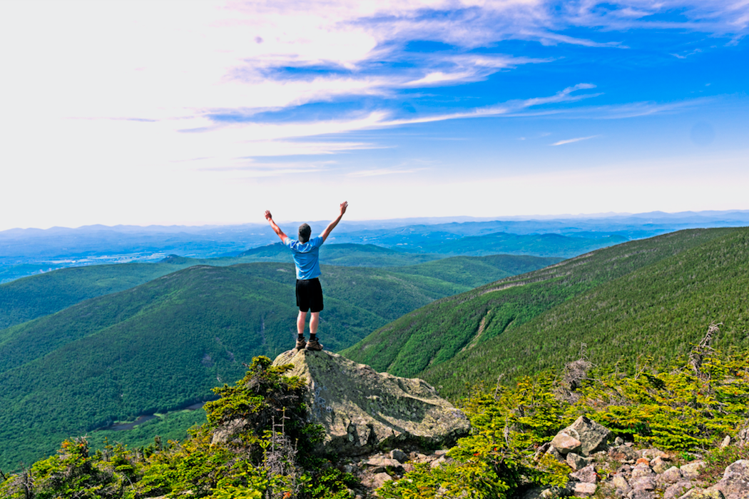 Yelling from a mountain because of financial freedom