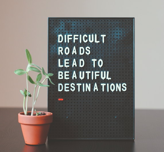 Sign: Difficult roads lead to beautiful destinations