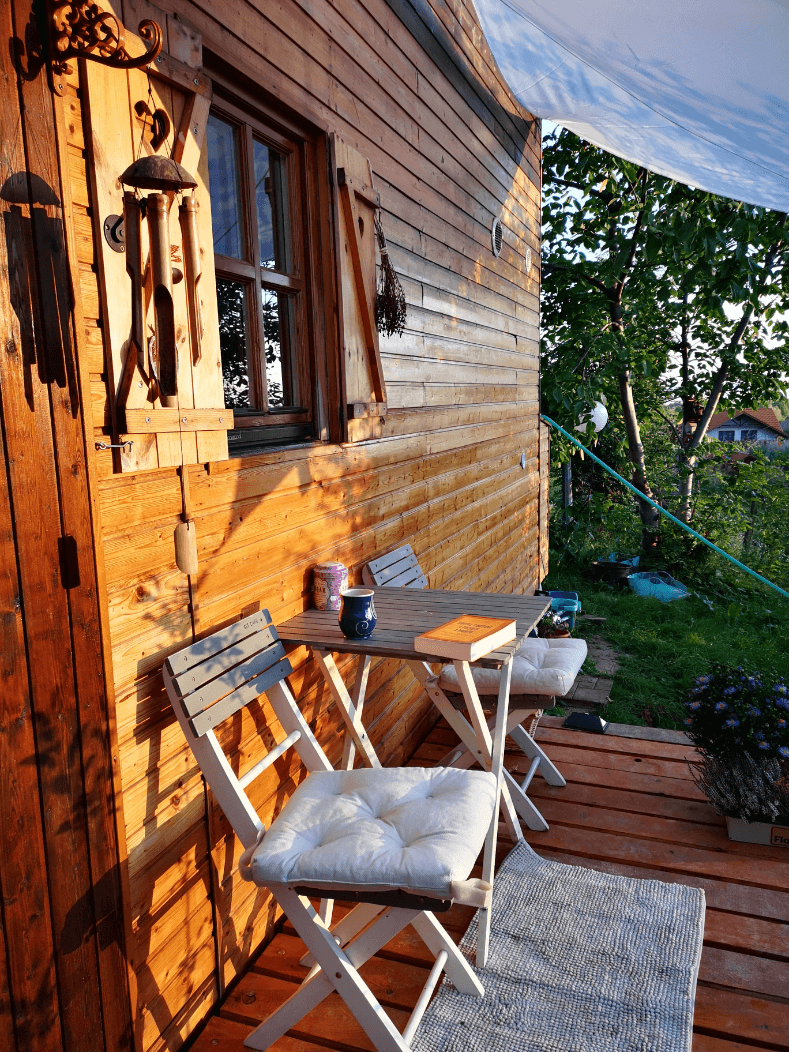 Chairs and table on wooden decking