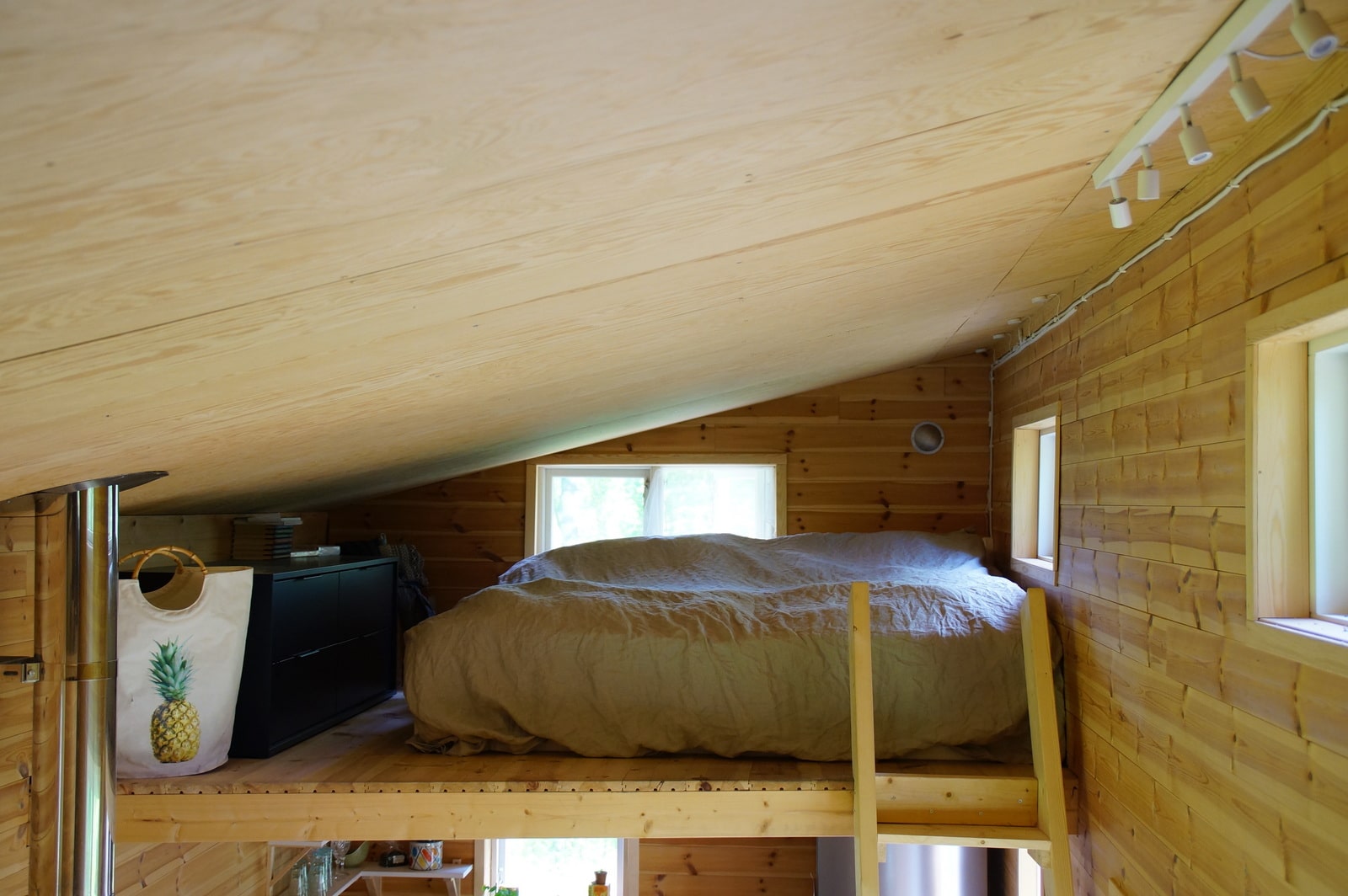 sleeping loft for family in tiny house